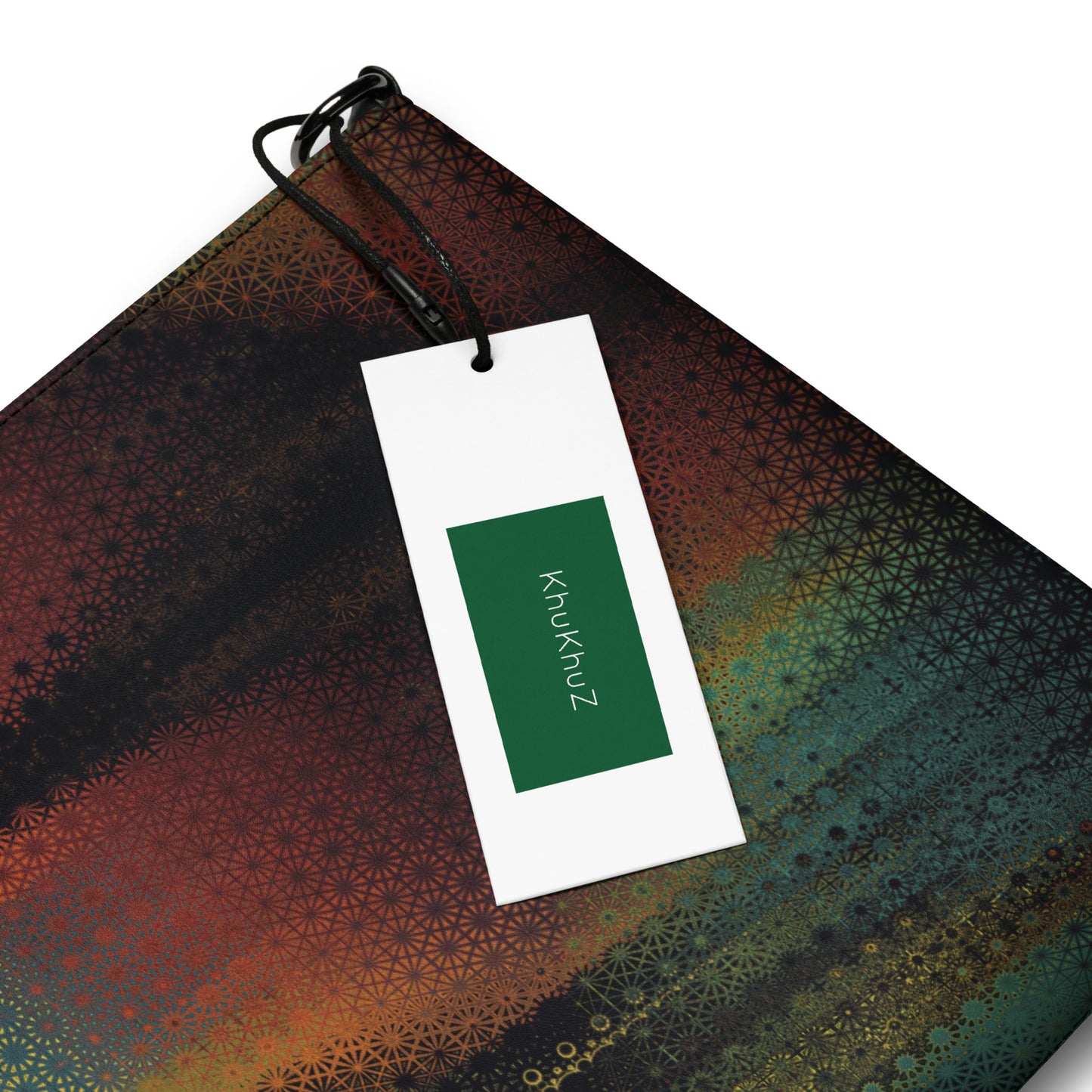 Colorful fabric with a pattern and a white tag displaying 'Khukhuz' on a white background