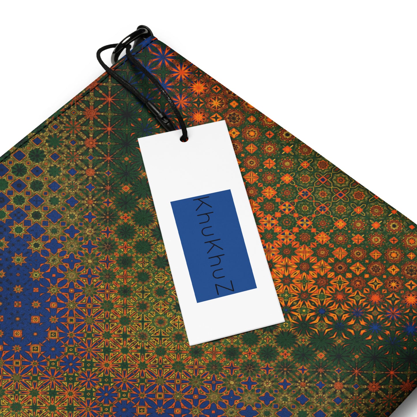 Colorful patterned fabric with a white tag displaying 'KhuKhuZ' on a white background