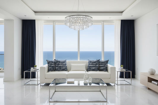 Navy and white tie-dye patterned pillow with a brand label on a white background