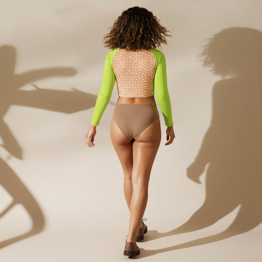 Woman wearing a neon green crop top with mocha mousse bikini and oxford shoes