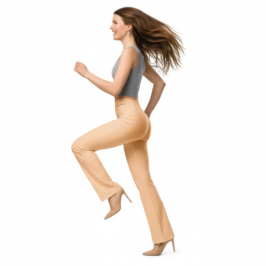 Woman wearing beige flared pants and a gray top on a white background