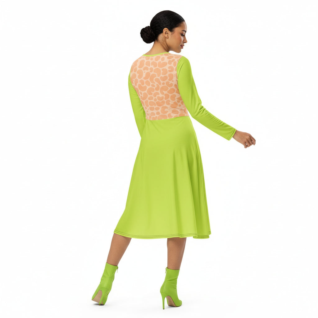 Woman wearing a green dress with a patterned back on a white background