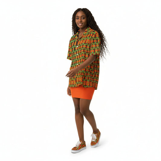 Person wearing a colorful patterned shirt and mini skirt against a plain background