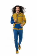 Man wearing a colorful hoodie and pants on a white background