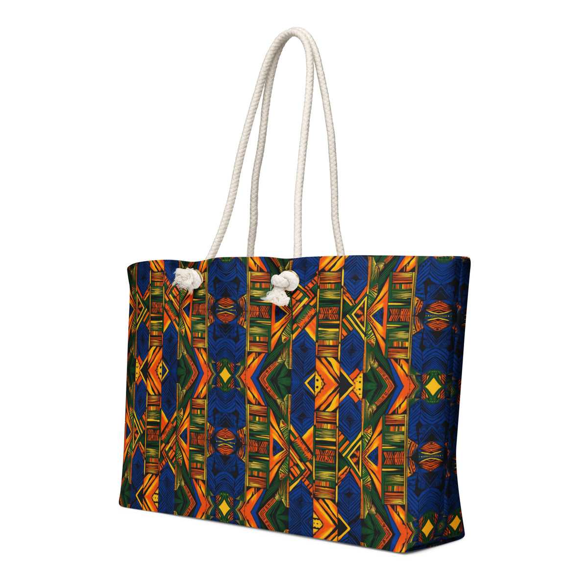 Oversized weekender bag in blue African print with white rope handles.