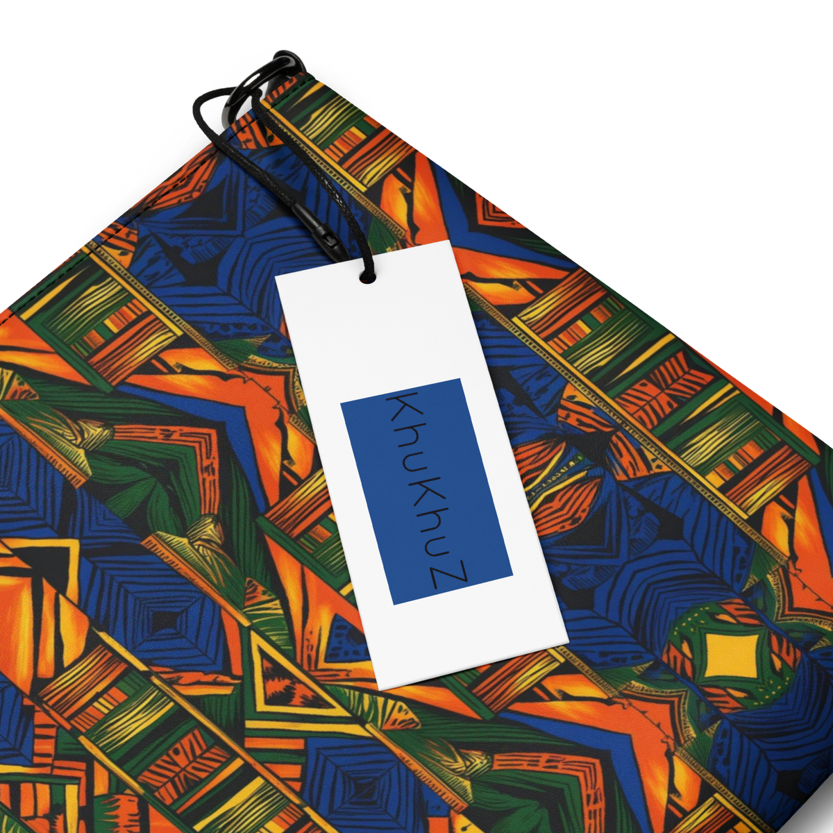 Colorful patterned fabric with a 'knukhuz' tag on a white background
