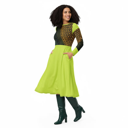 A woman wearing a long sleeve midi dress with a solid green color and floral pattern on the sleeves.