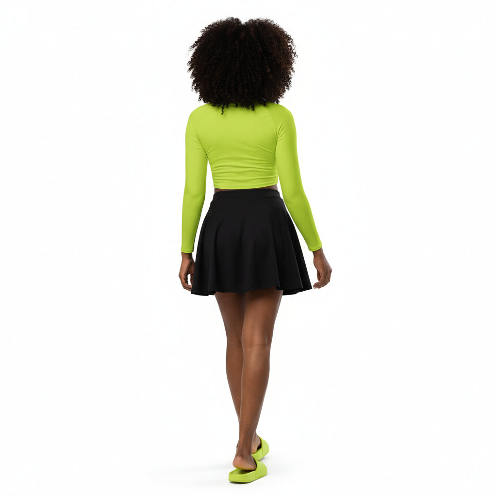 with this top wearing black mini skater skirt, with slides matching the top colour, walking confidently with curly hair