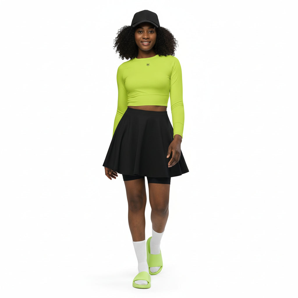 with this top wearing black mini skater skirt, with slides matching the top colour, walking confidently with curly hair