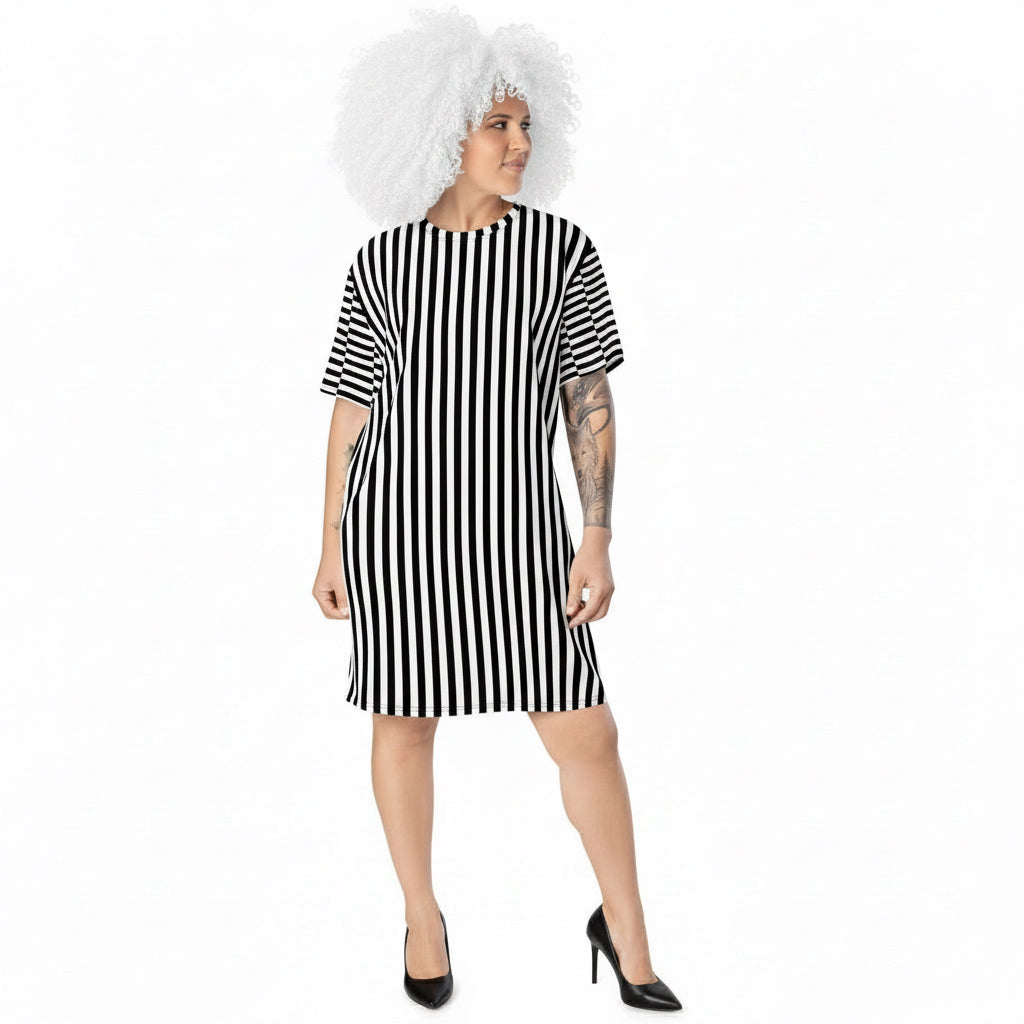 Woman wearing a black and white striped dress on a white background