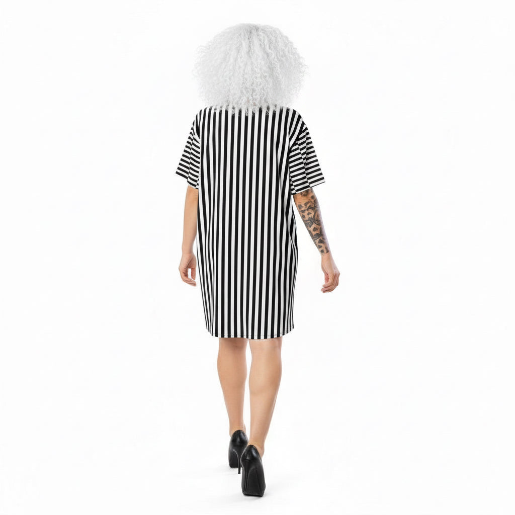 Wearing stylish high heeled black court shoes, walking with bouncing curls