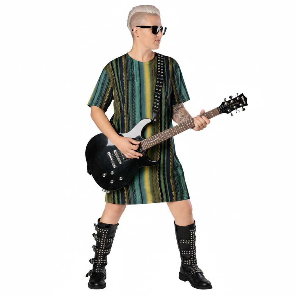 Person wearing a striped dress and black boots holding a guitar on a white background