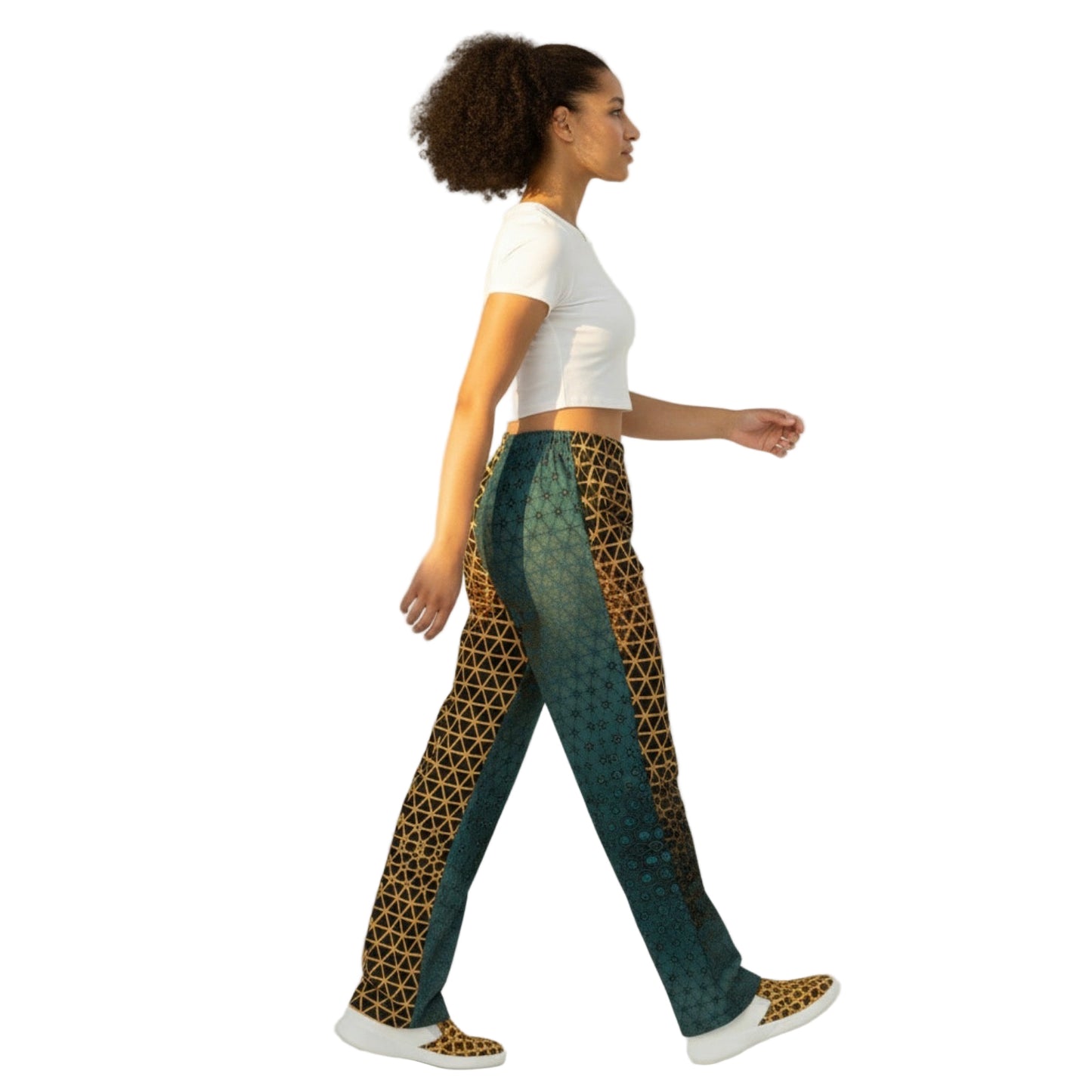 Woman wearing patterned pants walking on a white background