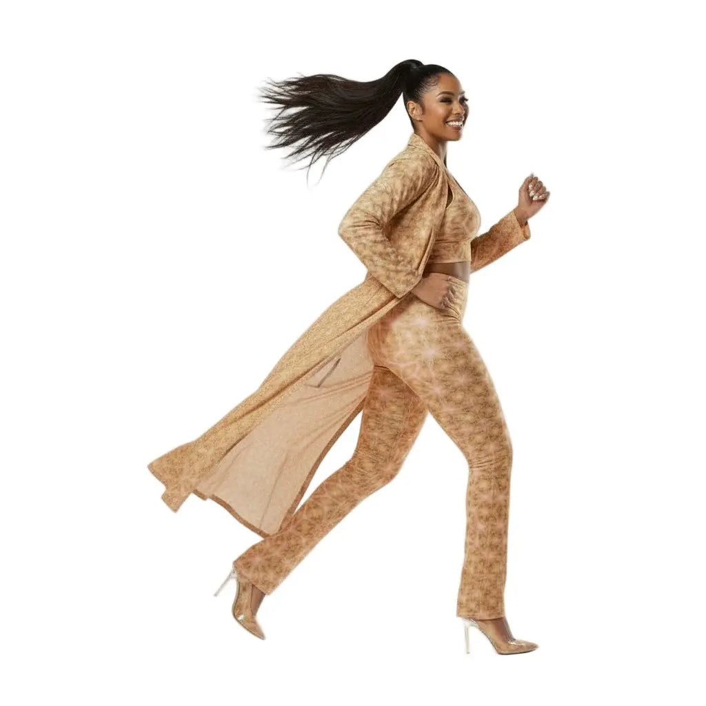 Woman in a peach fuzz print sports bra, long coat and leggings dancing and happy 