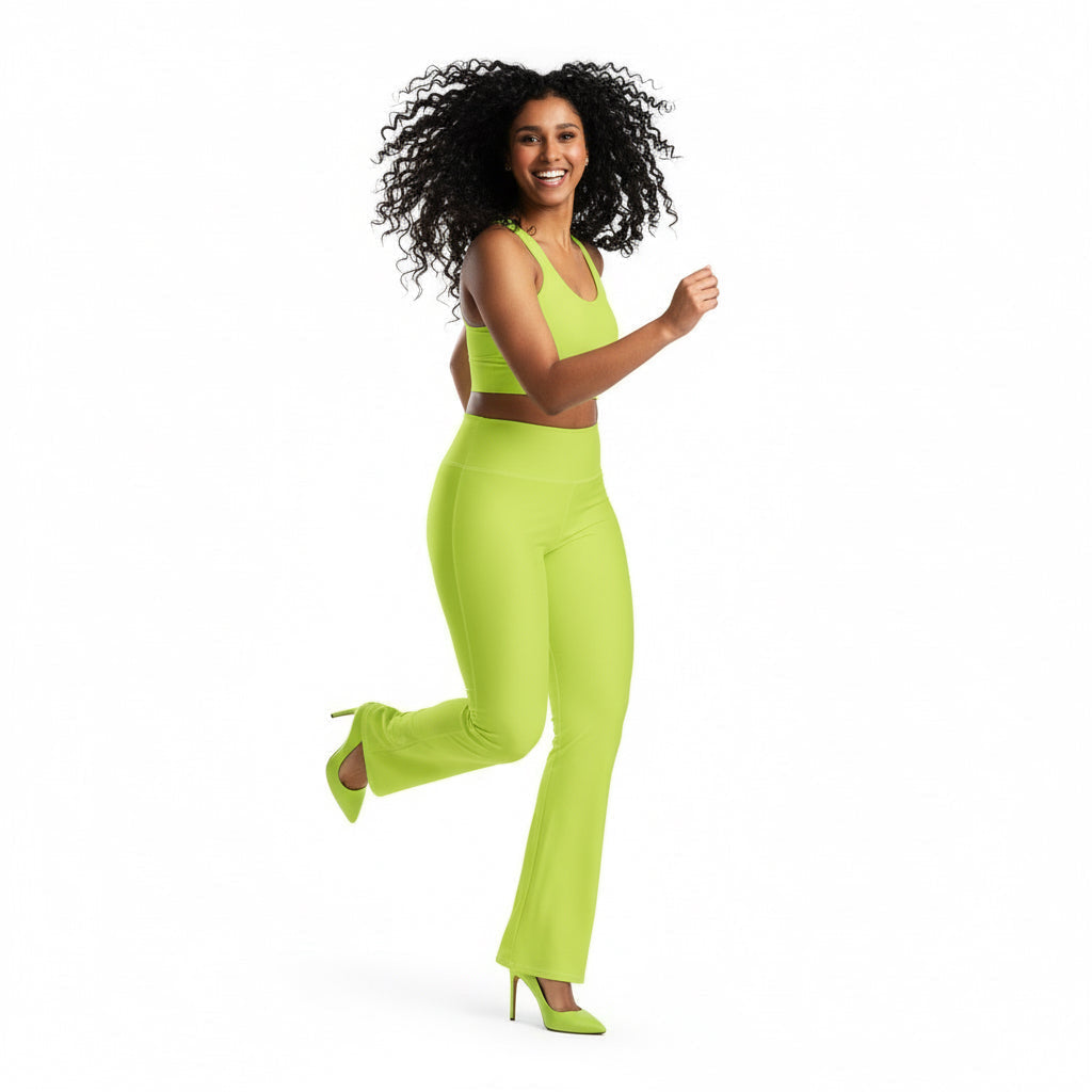 Woman in a bright green outfit running on a white background