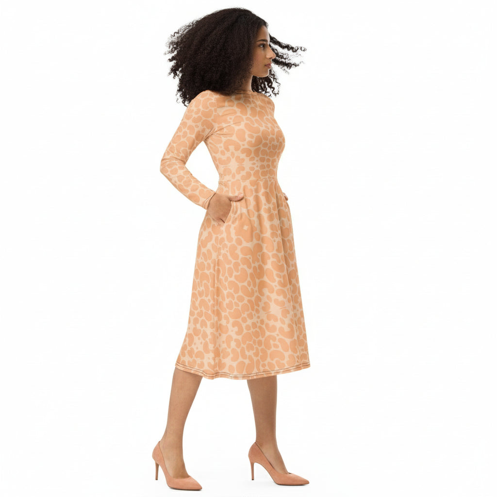 Woman wearing a patterned dress on a white background