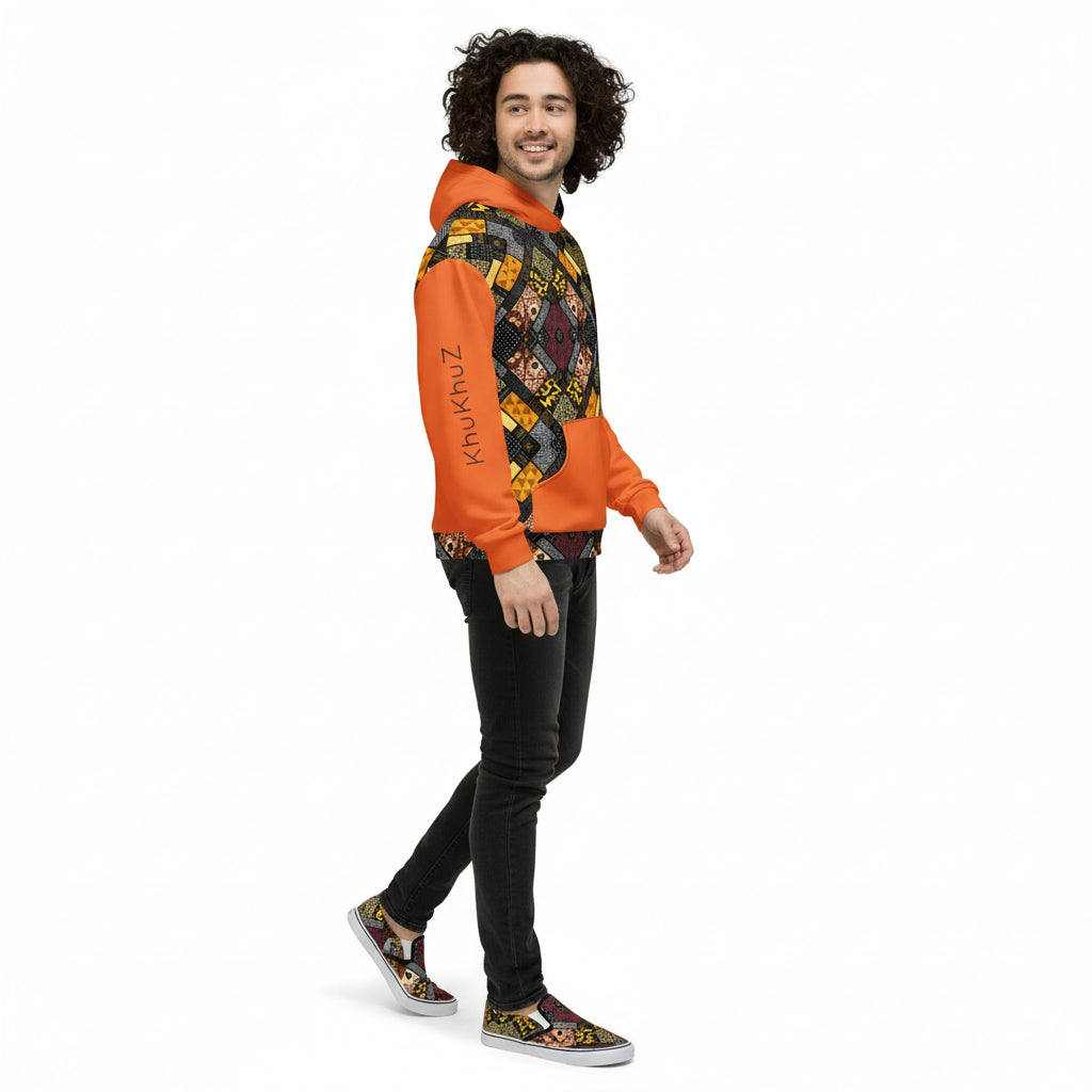 Person wearing a colorful hoodie with geometric patterns and 'Khukhuz' branding on a white background