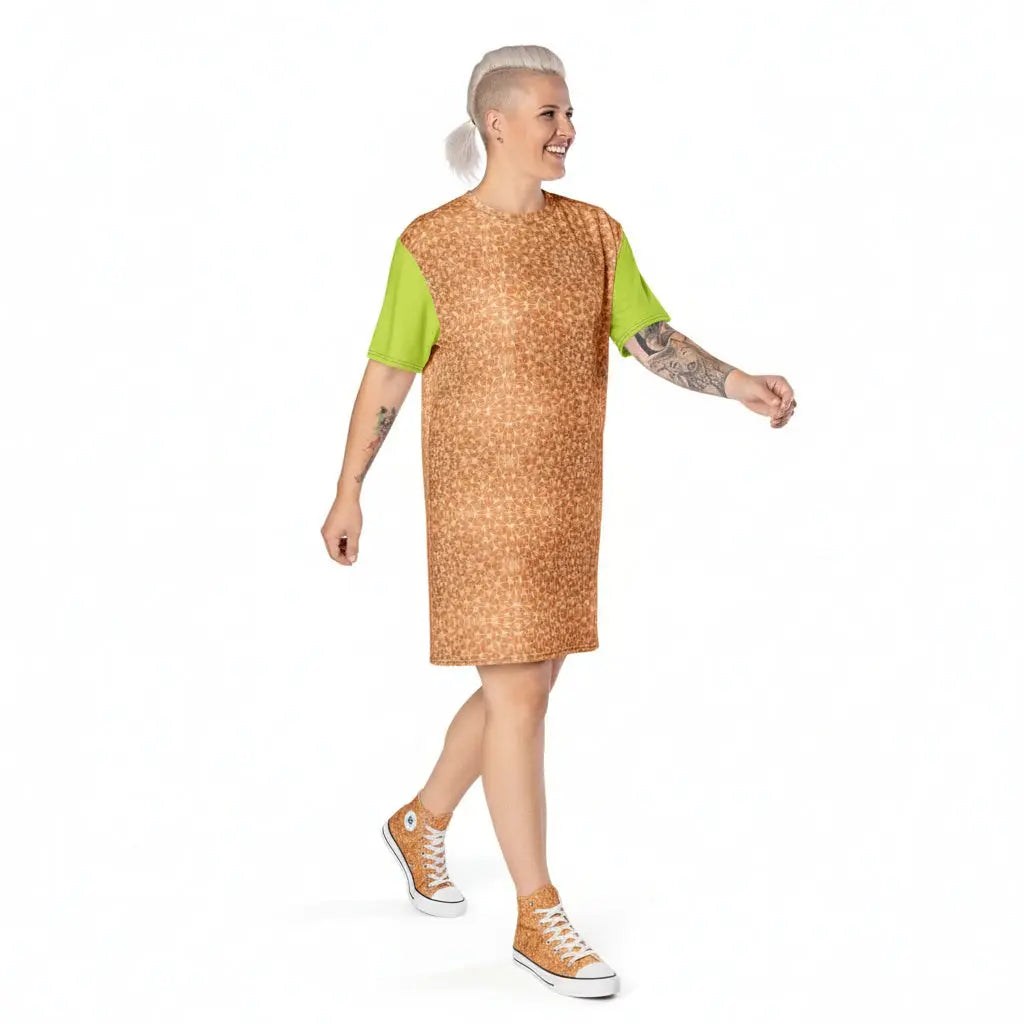 Woman wearing a patterned dress with green sleeves on a white background