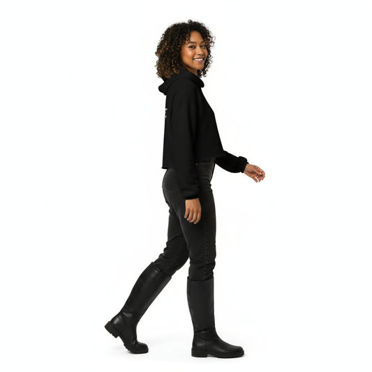 Wearing knee high boots and black jeans tucked in the boots. 