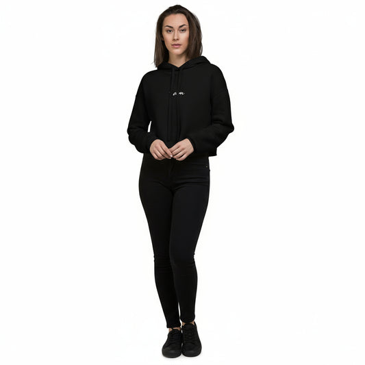 Person wearing a black hoodie with white text on a white background