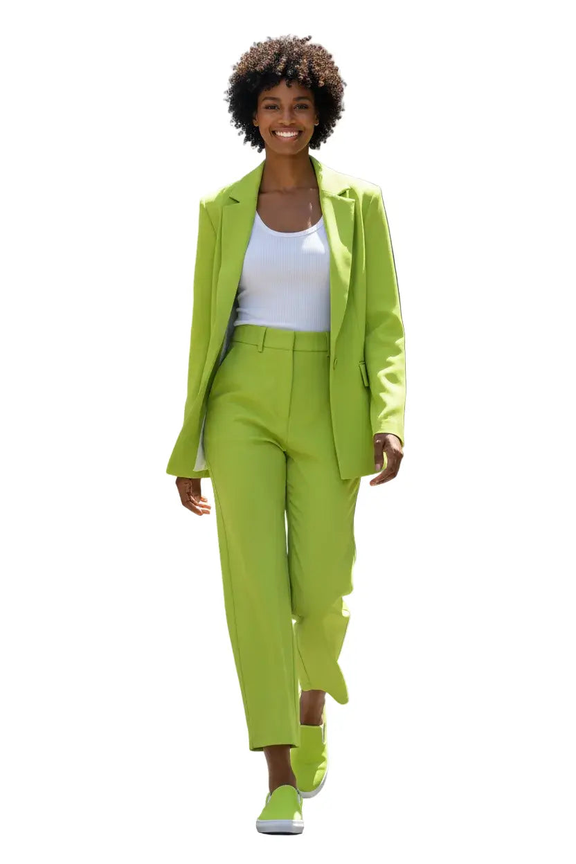Woman wearing a KhuKhuZ neon green suit with a white top on a white background